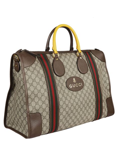 bauletto gucci 500|Large GG duffle bag in beige and ebony GG canvas .